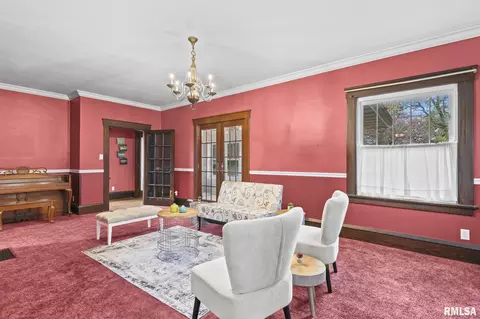 Living - 207 E Cherokee St, Morrisonville, IL 62546 photo 2 of 2