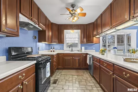 Kitchen - 207 E Cherokee St, Morrisonville, IL 62546 photo 1 of 4