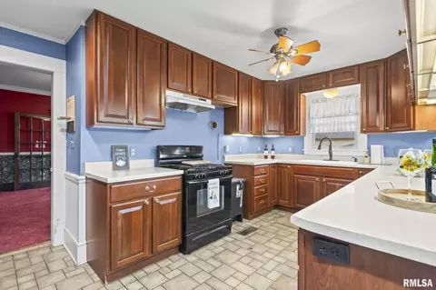Kitchen - 207 E Cherokee St, Morrisonville, IL 62546 photo 2 of 4