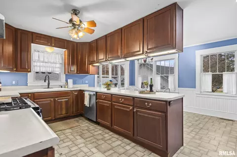 Kitchen - 207 E Cherokee St, Morrisonville, IL 62546 photo 3 of 4