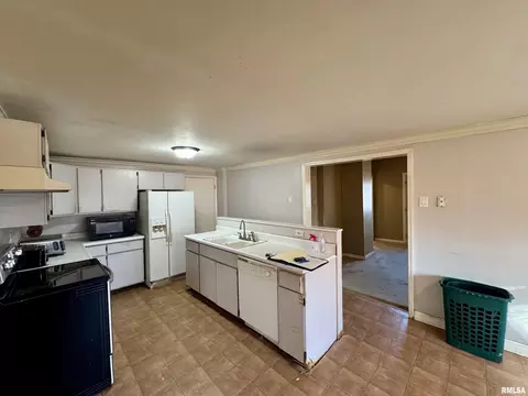 Kitchen - 309 N Main St, Payson, IL 62360 photo 1 of 2