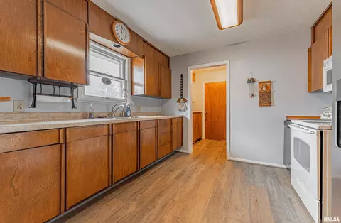 Kitchen - 320 E Jasper St, Mount Pulaski, IL 62548 photo 1 of 2