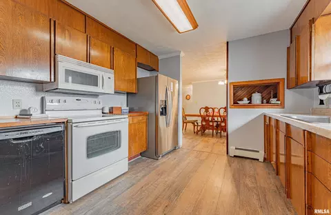 Kitchen - 320 E Jasper St, Mount Pulaski, IL 62548 photo 2 of 2