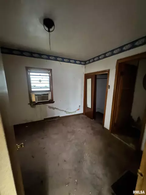 Bedroom - 1008 3rd St, Lincoln, IL 62656 photo 1 of 2