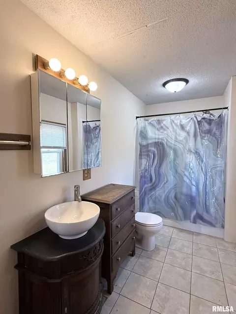Bath - 212 Academy St, Cameron, IL 61423 photo 1 of 1