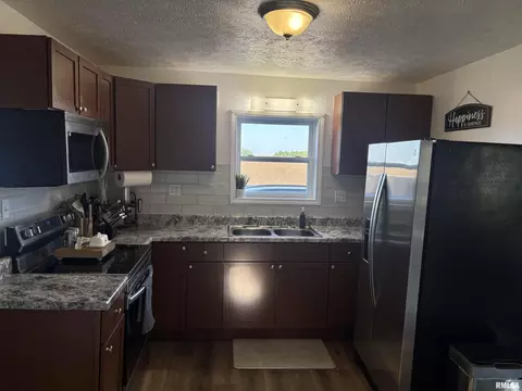 Kitchen - 731 E Jackson St, Virden, IL 62690 photo 2 of 3