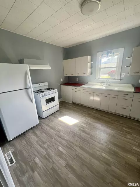 Kitchen - 101 N Cedar St, Bowen, IL 62316 photo 2 of 2
