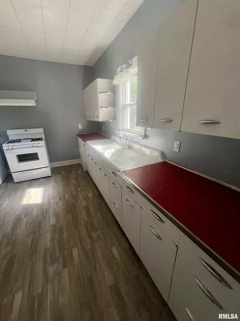Kitchen - 101 N Cedar St, Bowen, IL 62316 photo 1 of 2