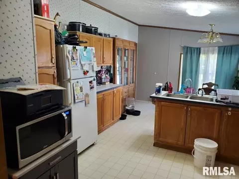 Kitchen - 205-207 W Perkins St, Payson, IL 62360 photo 2 of 3