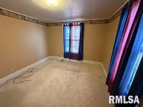 Bedroom - 218 N Stanton St, Bluffs, IL 62621 photo 2 of 2