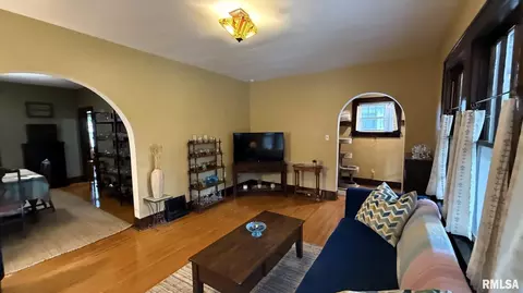 Living - 1720 S State St, Springfield, IL 62704 photo 2 of 2