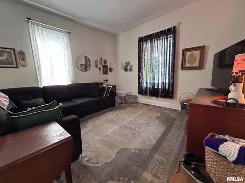 Living - 838 S Douglas Ave, Springfield, IL 62704 photo 1 of 2