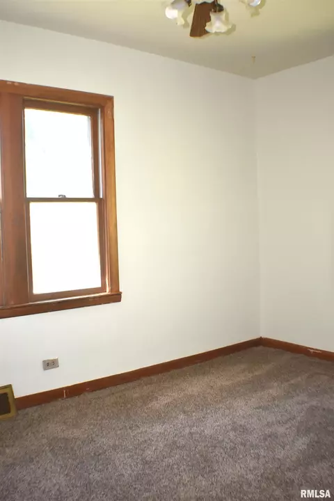 Bedroom - 707 E Ash St, Canton, IL 61520 photo 2 of 7