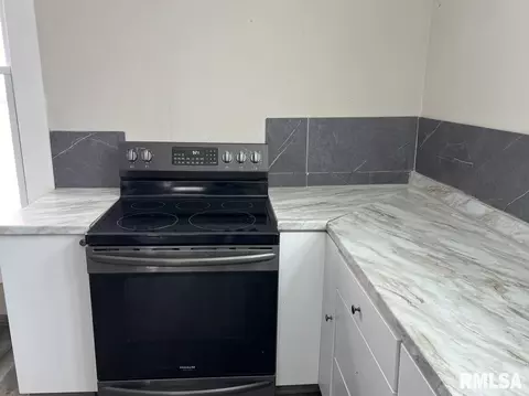 Kitchen - 414 E Pierce St, Macomb, IL 61455 photo 2 of 2
