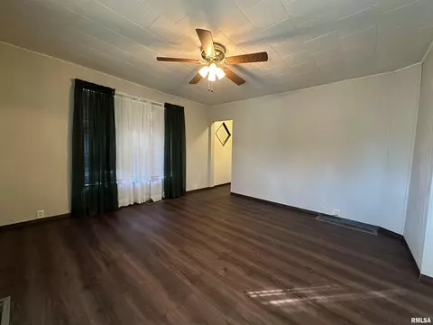 Living - 1004 E Pierce St, Macomb, IL 61455 photo 1 of 2