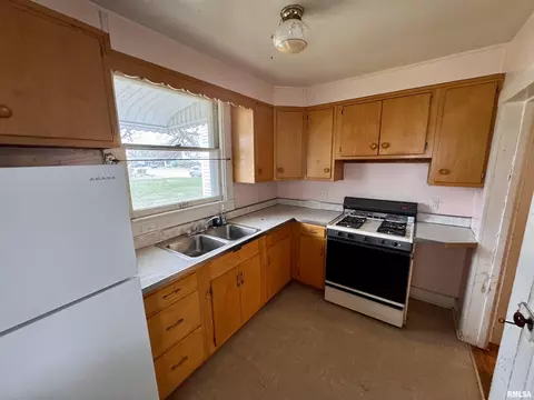 Kitchen - 727 E Jackson St, Macomb, IL 61455 photo 2 of 2