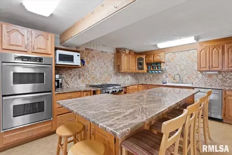 Kitchen - 10522 W Lancaster Rd, Mapleton, IL 61547 photo 10 of 17