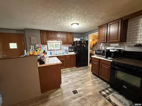 Kitchen - 1320 E Wheeler St, Macomb, IL 61455 photo 2 of 2