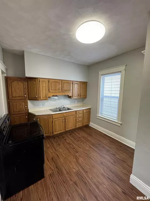 Kitchen - 60 E Ash St, Canton, IL 61520 photo 3 of 4