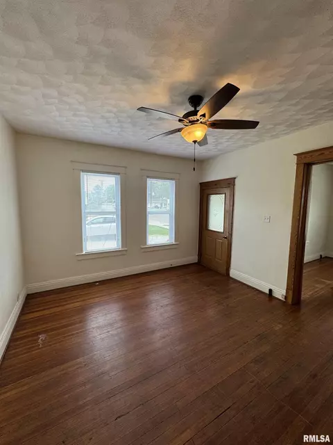 Living - 60 E Ash St, Canton, IL 61520 photo 3 of 4