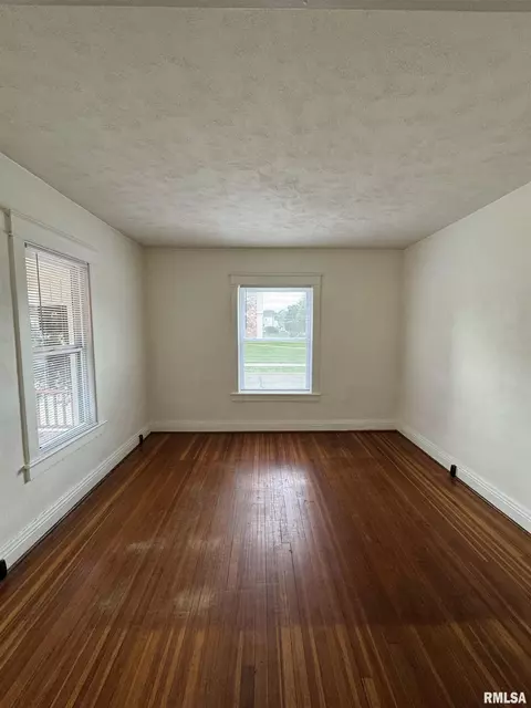 Living - 60 E Ash St, Canton, IL 61520 photo 4 of 4