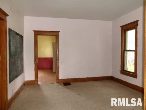 Living - 896 E Chestnut St, Canton, IL 61520 photo 2 of 2