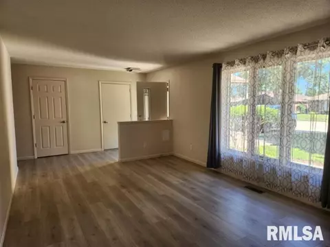 Living - 409 Evergreen Dr, Macomb, IL 61455 photo 2 of 2