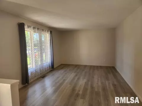 Living - 409 Evergreen Dr, Macomb, IL 61455 photo 1 of 2