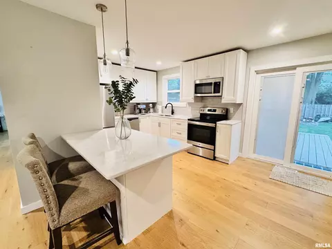 Kitchen - 702 S Pearl St, Macomb, IL 61455 photo 1 of 6