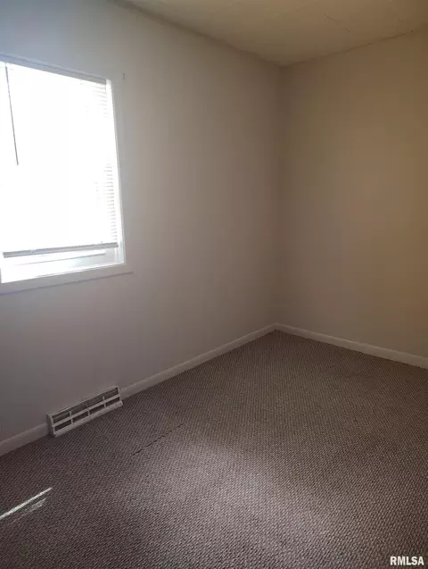 Bedroom - 1031 E Olive St, Canton, IL 61520 photo 2 of 3