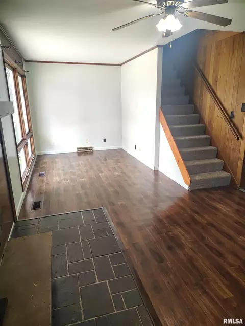 Living - 1031 E Olive St, Canton, IL 61520 photo 1 of 4