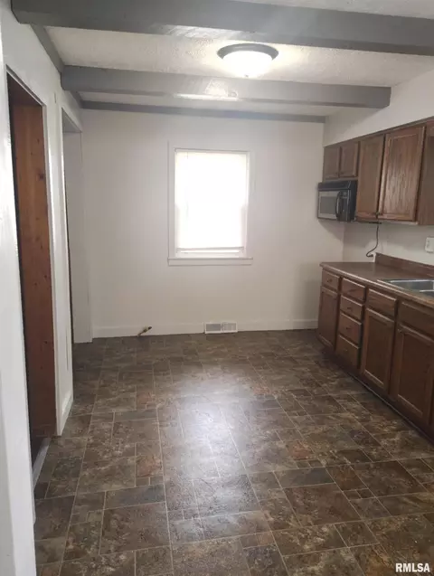 Kitchen - 1031 E Olive St, Canton, IL 61520 photo 3 of 3