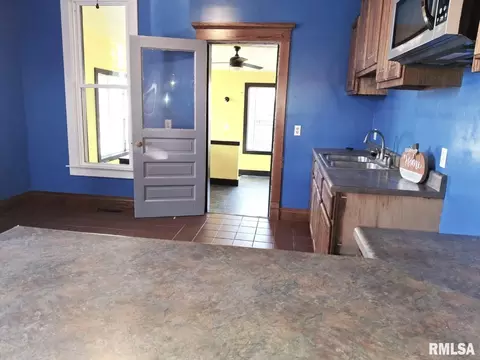 Kitchen - 335 S 5th Ave, Canton, IL 61520 photo 1 of 3