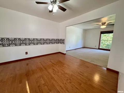 Living - 1707 Riverview Dr, Macomb, IL 61455 photo 4 of 8