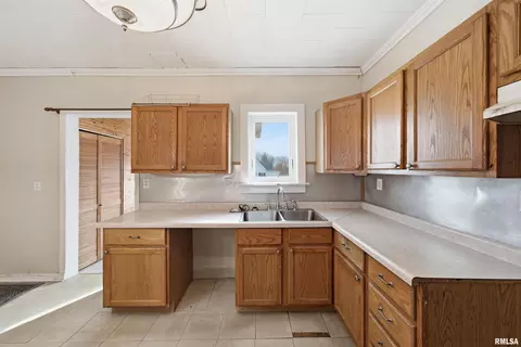Kitchen - 412 W Maple St, Canton, IL 61520 photo 2 of 4