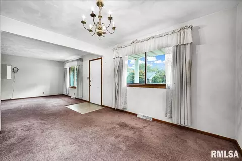 Living - 1215 E Sycamore St, Canton, IL 61520 photo 5 of 5