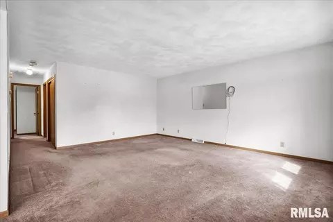 Living - 1215 E Sycamore St, Canton, IL 61520 photo 1 of 5