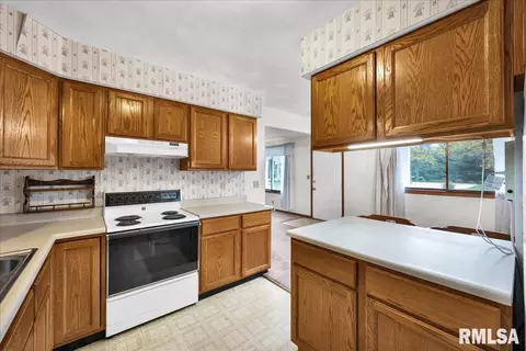 Kitchen - 1215 E Sycamore St, Canton, IL 61520 photo 2 of 2