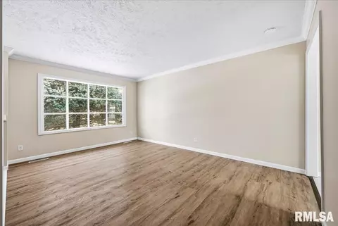 Living - 1721 Johnson Dr, Normal, IL 61761 photo 2 of 5