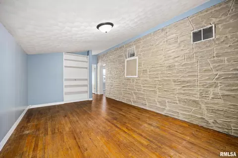 Living - 1908 Commonwealth Ave, Pekin, IL 61554 photo 2 of 3