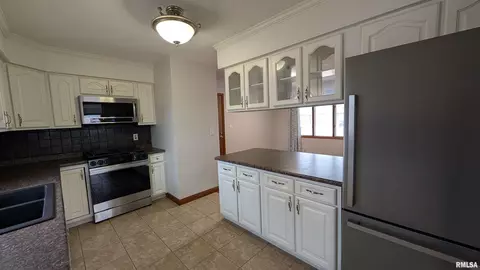 Kitchen - 1267 E Locust St, Canton, IL 61520 photo 2 of 5