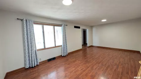 Living - 1267 E Locust St, Canton, IL 61520 photo 7 of 13