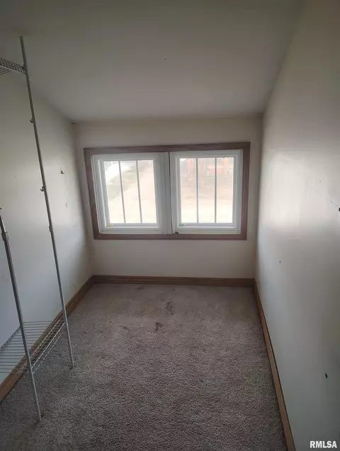 Bedroom - 646 E Locust St, Canton, IL 61520 photo 2 of 4