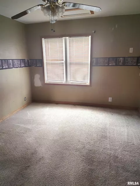 Bedroom - 646 E Locust St, Canton, IL 61520 photo 1 of 4