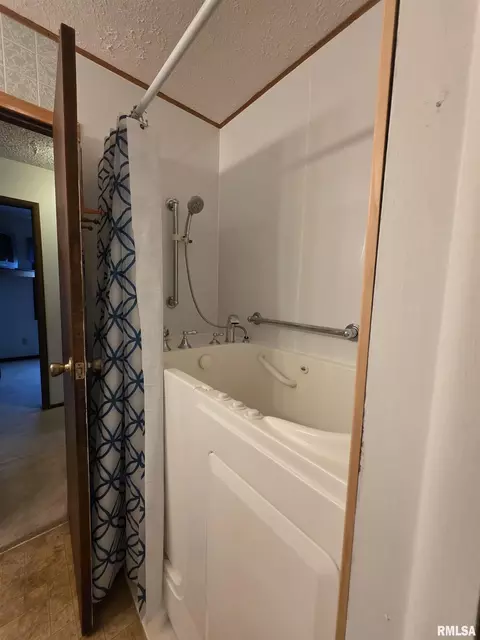 Bath - 917 E Baker St, Bloomington, IL 61701 photo 2 of 2