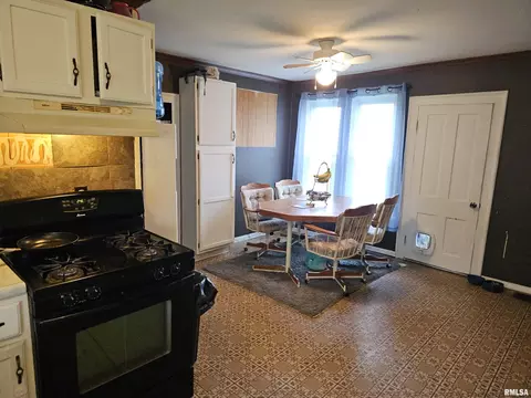 Kitchen - 203 State St, Benson, IL 61516 photo 3 of 3