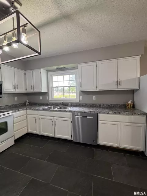 Kitchen - 834 E Franklin St, Macomb, IL 61455 photo 3 of 7
