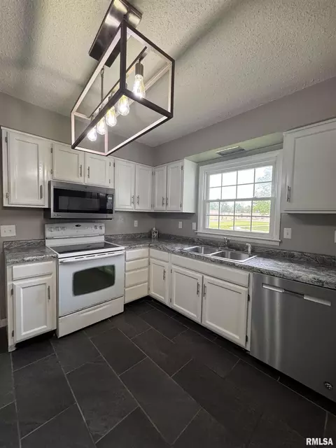 Kitchen - 834 E Franklin St, Macomb, IL 61455 photo 4 of 7