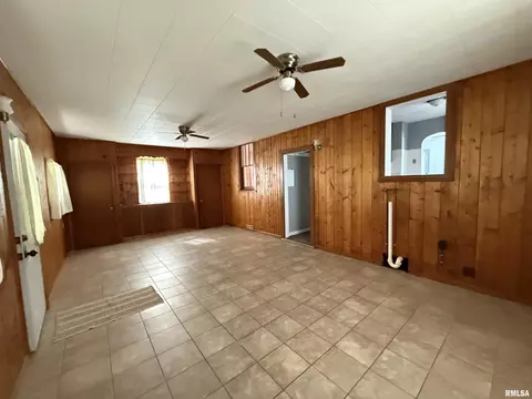 Living - 1478 E Chestnut St, Canton, IL 61520 photo 1 of 9