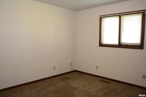 Bedroom - 1220 Maple Ave, Macomb, IL 61455 photo 3 of 4